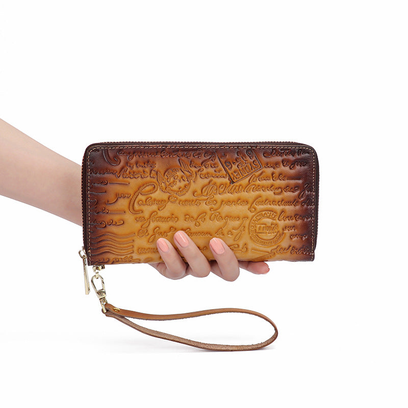 new factory direct sales retro hand-held ladies wallet first layer cowhide embossed English coin purse can be wholesale