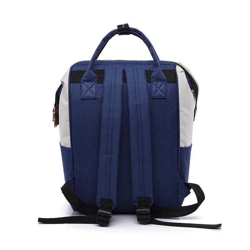 Mommy bag 2025 new Korean style fashion canvas color matching backpack women's bag Baoma milk bottle bag