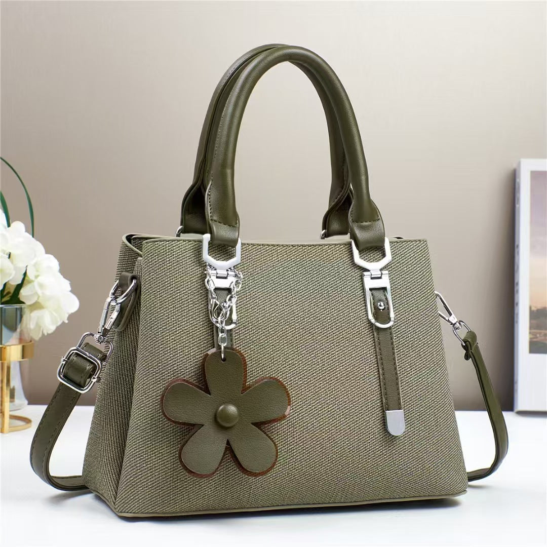 New style handbags are fashionable, simple and stylish, with large capacity and exquisite accessories, and are available for cross-border delivery.
