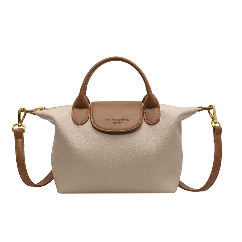 Cross-border contrast color dumpling bag ladies 2025 new casual versatile shoulder bag high-end hand-held commuter messenger bag