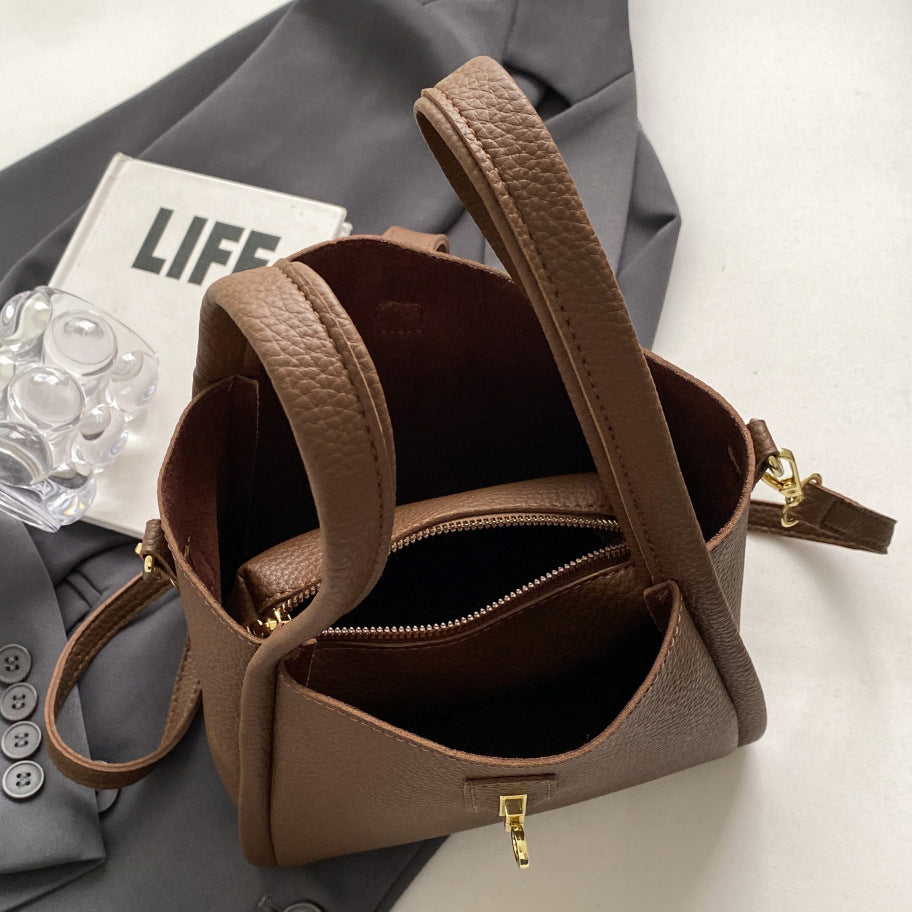 New autumn and winter simple high-end bag women's fashionable all-match retro commuter messenger bag textured portable bucket bag