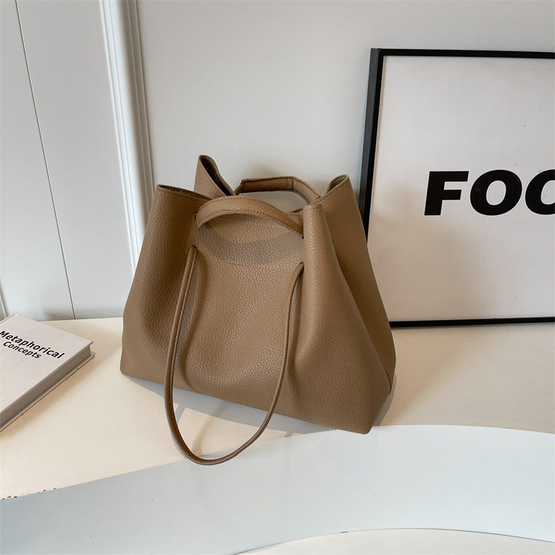 Large capacity bag for women 2025 super hot fashion texture hand-held shoulder bag versatile work commuting armpit tote bag