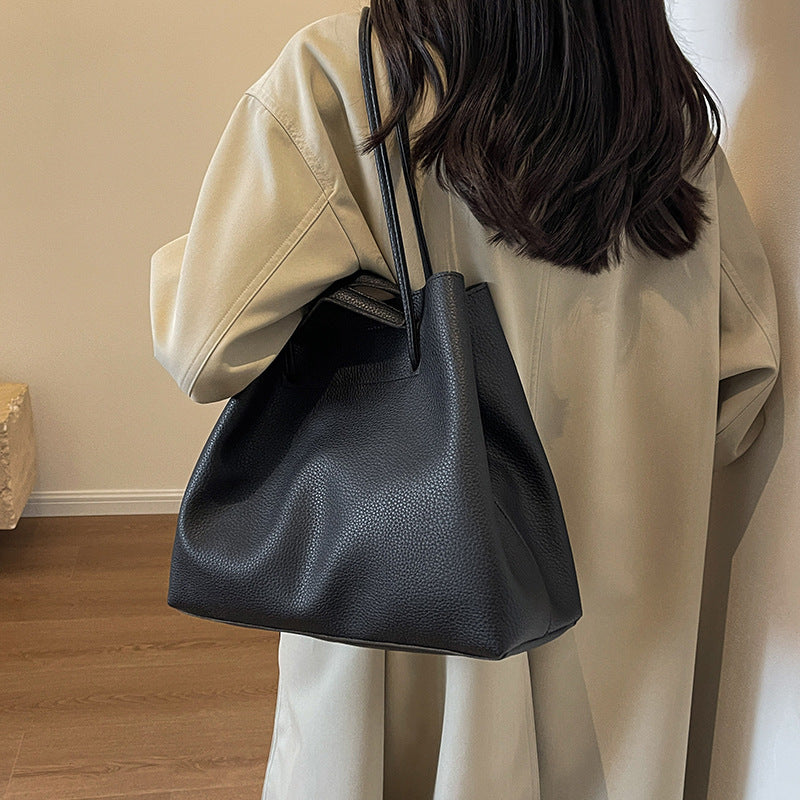 Large capacity bag for women 2025 super hot fashion texture hand-held shoulder bag versatile work commuting armpit tote bag