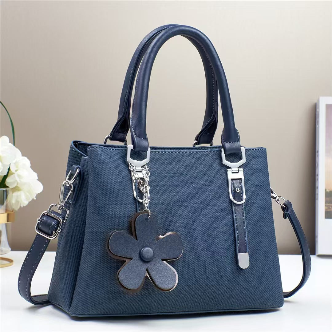 New style handbags are fashionable, simple and stylish, with large capacity and exquisite accessories, and are available for cross-border delivery.