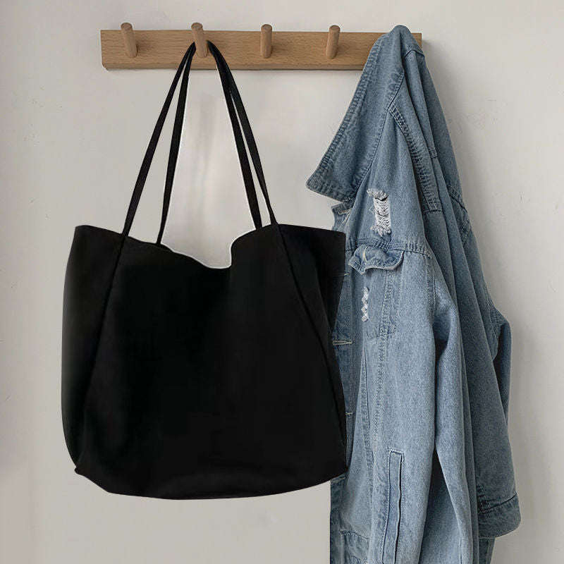 Japanese lazy style large capacity hand-held shoulder bag environmentally friendly shopping bag simple Korean version student literary canvas schoolbag