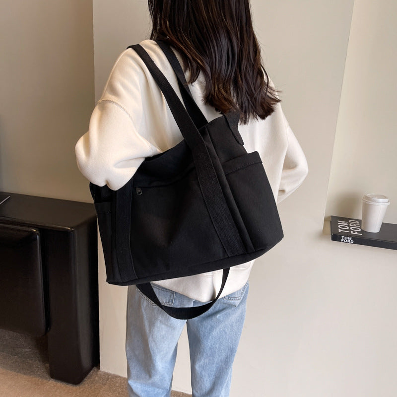 Foreign trade new large capacity canvas shoulder bag women's messenger bag simple solid color handbag large capacity tote bag