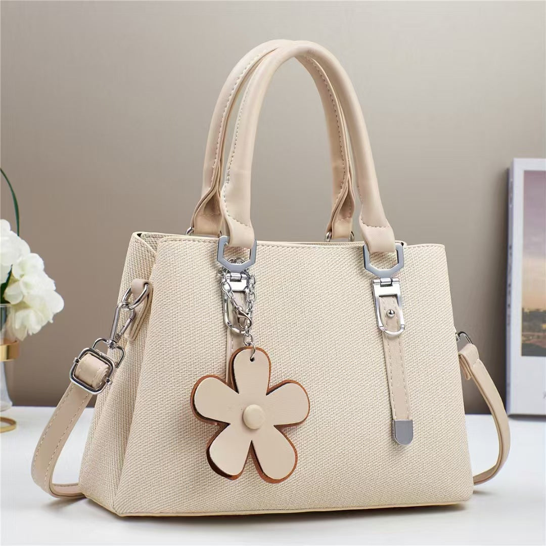 New style handbags are fashionable, simple and stylish, with large capacity and exquisite accessories, and are available for cross-border delivery.