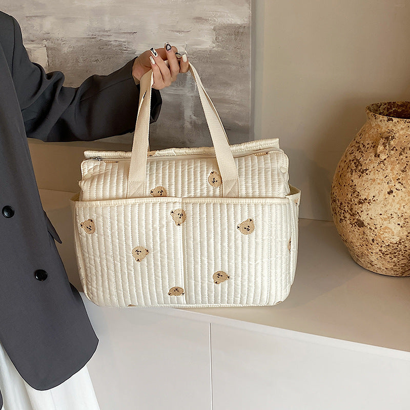 Cross-border mommy bag with full embroidery Korean style fashionable multifunctional mother and baby bag for going out, can hang baby carriage, large capacity mommy bag