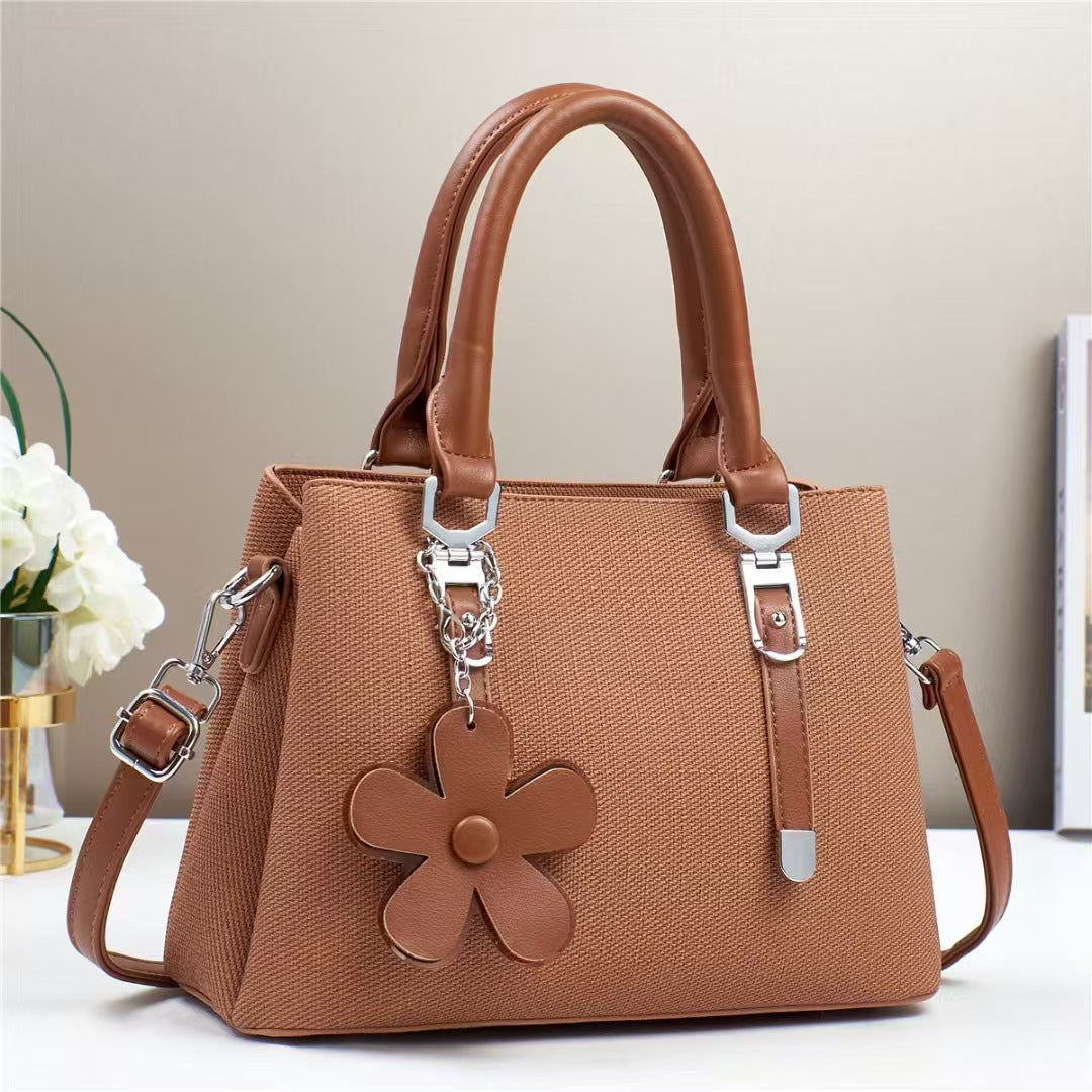 New style handbags are fashionable, simple and stylish, with large capacity and exquisite accessories, and are available for cross-border delivery.