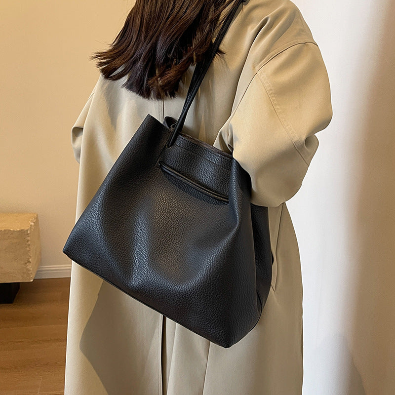 Large capacity bag for women 2025 super hot fashion texture hand-held shoulder bag versatile work commuting armpit tote bag