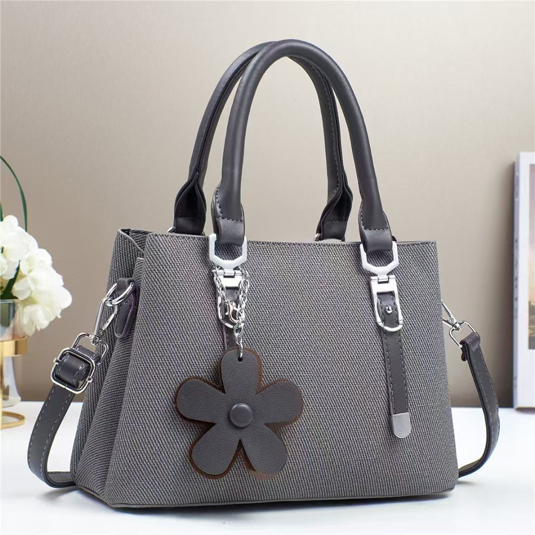 New style handbags are fashionable, simple and stylish, with large capacity and exquisite accessories, and are available for cross-border delivery.