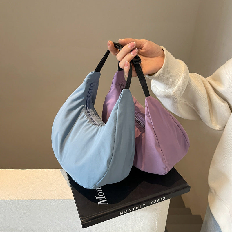 Korean style lightweight casual dumpling bag women's solid color simple crescent handbag commuting literary shoulder messenger bag