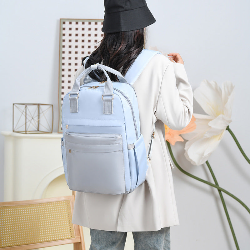 New style mommy bag with double compartments in front and back, large capacity mother and baby bag, fashionable and multifunctional mommy bag backpack for traveling