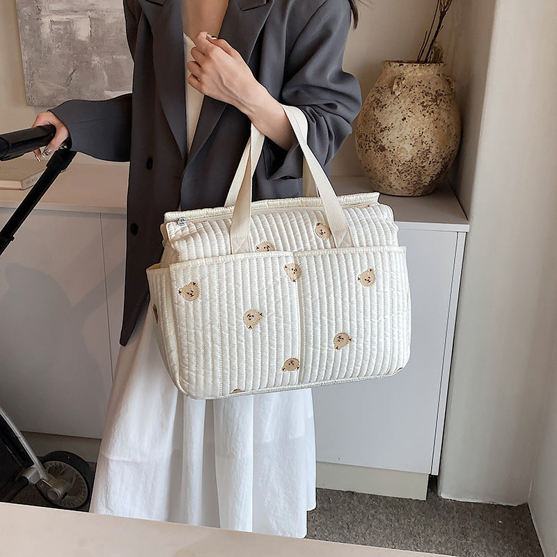 Cross-border mommy bag with full embroidery Korean style fashionable multifunctional mother and baby bag for going out, can hang baby carriage, large capacity mommy bag