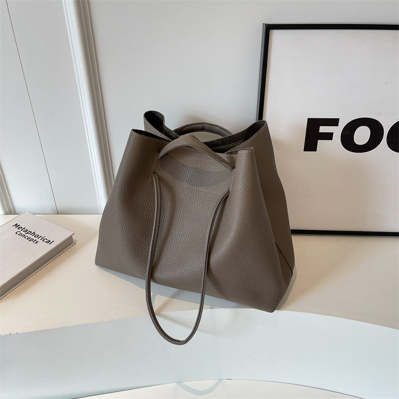 Large capacity bag for women 2025 super hot fashion texture hand-held shoulder bag versatile work commuting armpit tote bag