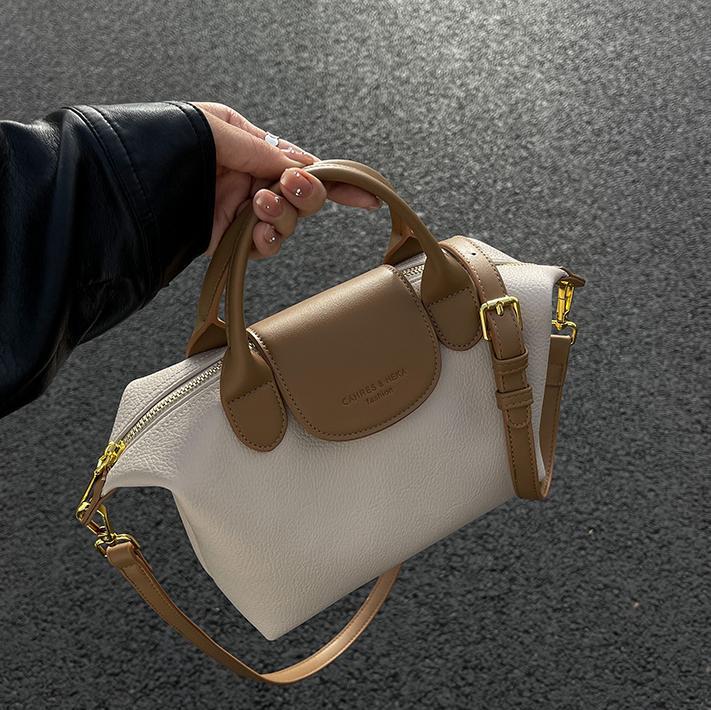 Cross-border contrast color dumpling bag ladies 2025 new casual versatile shoulder bag high-end hand-held commuter messenger bag