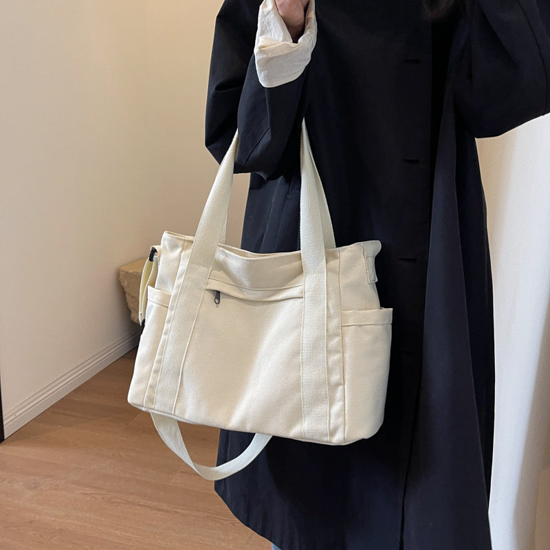 Foreign trade new large capacity canvas shoulder bag women's messenger bag simple solid color handbag large capacity tote bag