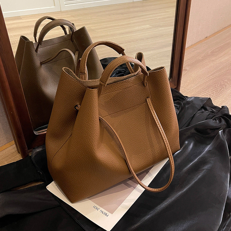 Large capacity bag for women 2025 super hot fashion texture hand-held shoulder bag versatile work commuting armpit tote bag