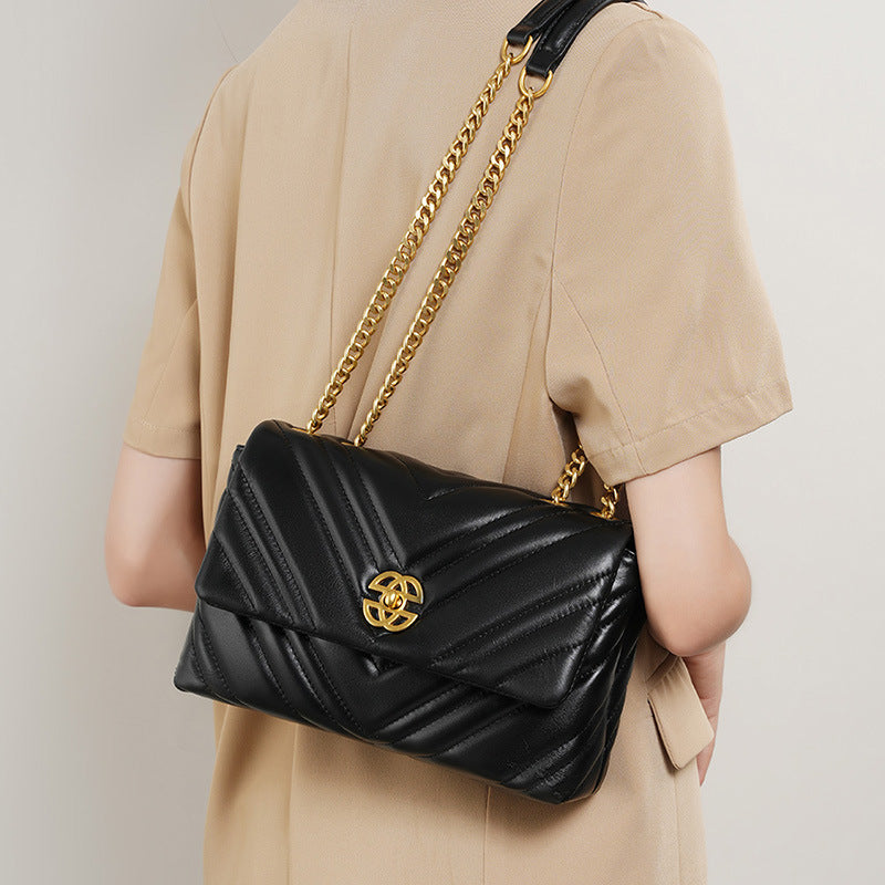 High-grade diamond chain small square bag women 2025 new ladies cowhide underarm bag genuine leather shoulder oblique