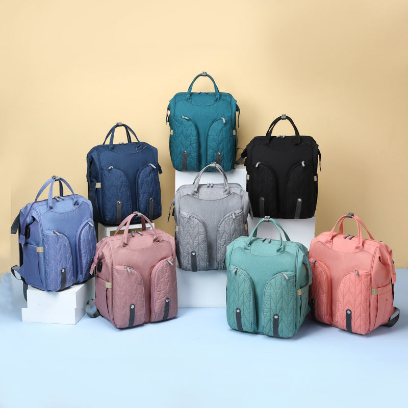 Korean version of mommy bag baby bed large capacity backpack with baby bag fabric Bao mom outing backpack waterproof