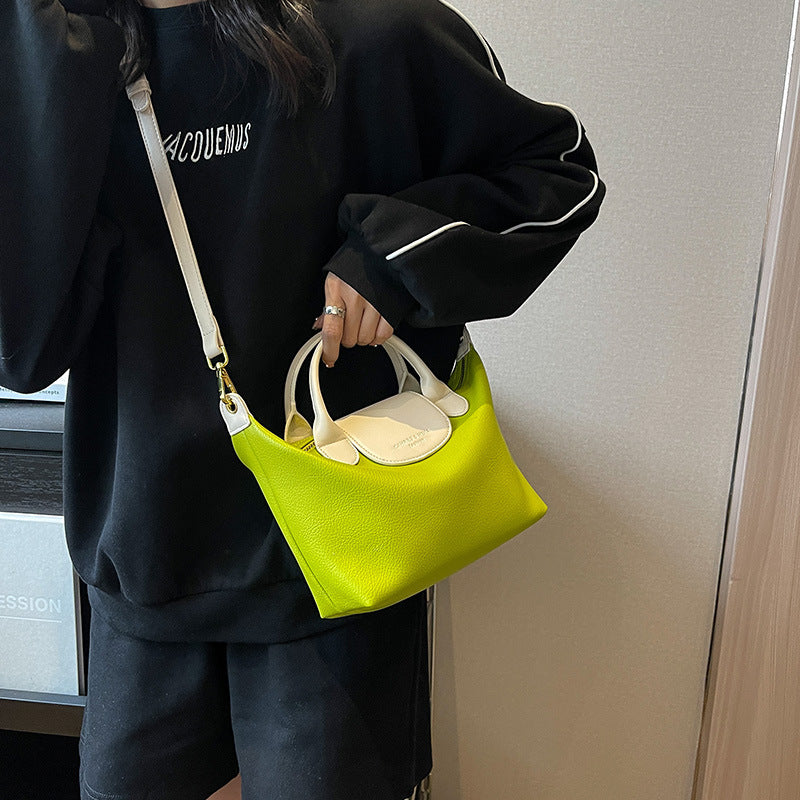 Cross-border contrast color dumpling bag ladies 2025 new casual versatile shoulder bag high-end hand-held commuter messenger bag