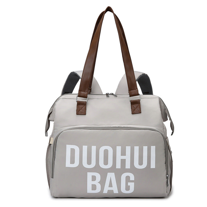 Mommy bag hot sale large size horizontal version multifunctional mother and baby bag can be carried on the shoulder or crossbody when going out