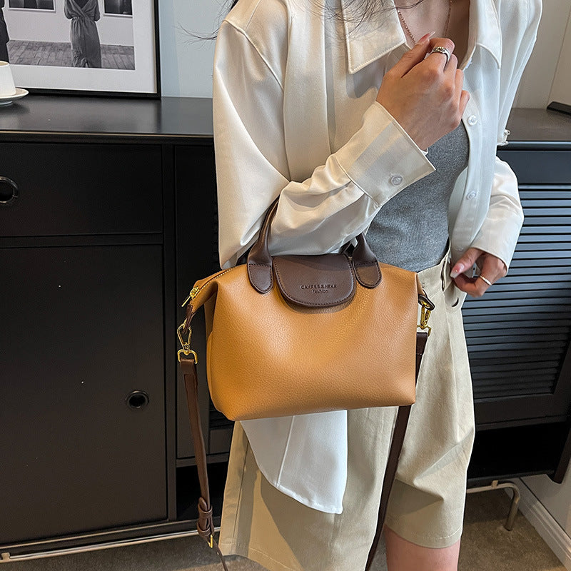 Cross-border contrast color dumpling bag ladies 2025 new casual versatile shoulder bag high-end hand-held commuter messenger bag