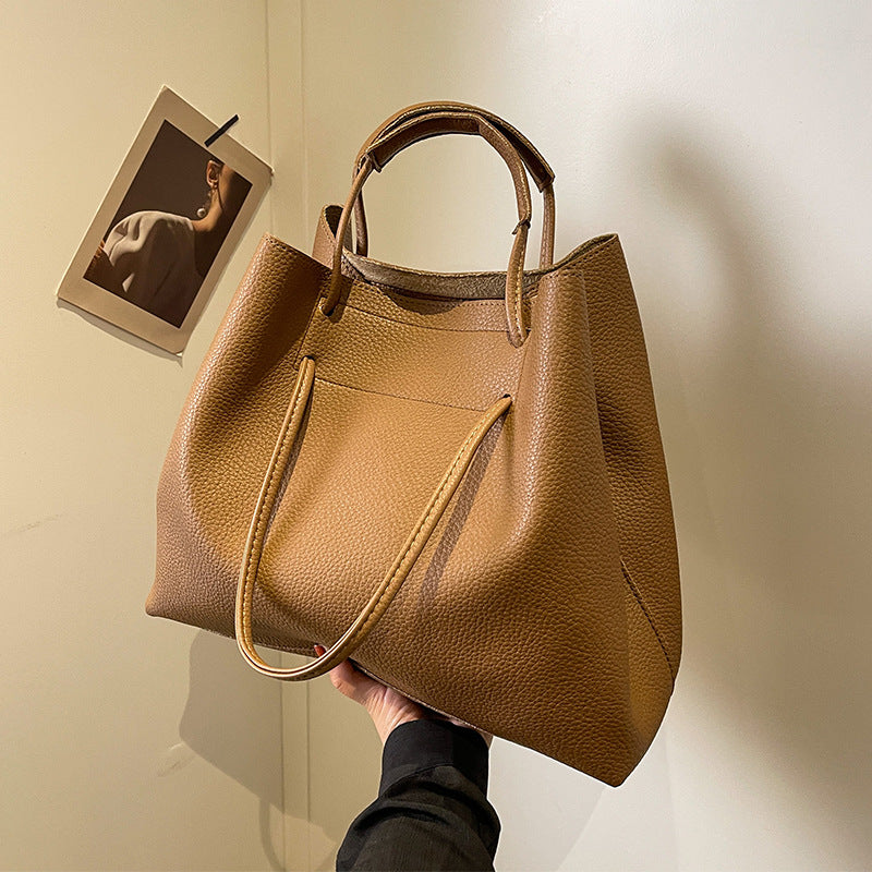 Large capacity bag for women 2025 super hot fashion texture hand-held shoulder bag versatile work commuting armpit tote bag
