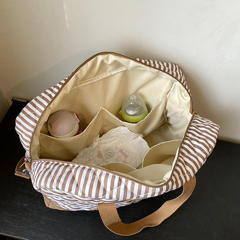 Fashion striped spring mommy bag for traveling, high-value hand-held mother and baby bag, large-capacity single-shoulder mommy bag