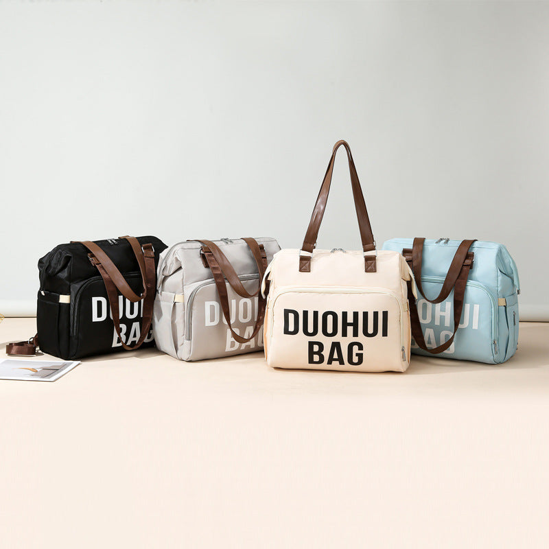 Mommy bag hot sale large size horizontal version multifunctional mother and baby bag can be carried on the shoulder or crossbody when going out